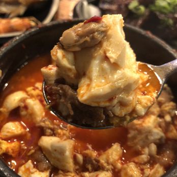 BCD Tofu House - Another mouth full, be careful, is steaming hot - Korean Near Me - Artesia, California BCD Tofu House - Another mouth full, be careful, is steaming hot - Korean Near Me - Artesia, California