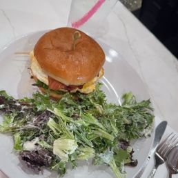 Breakfast sandwich and greens