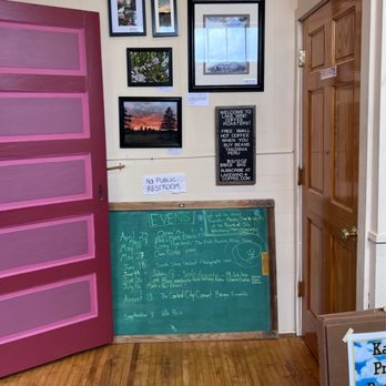 Lake Wind Coffee - a chalkboard in the corner of a room - Coffee & Tea Near Me - Port Wing, Wisconsin