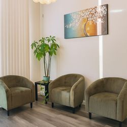 Bosmar Spa - Cozy waiting area at Bosmar Spa  -- a peaceful space where guests can relax before their massage session.