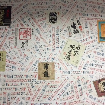 Kenka - Chopstick wrapper wallpaper in the bathrooms - Sushi Bars Near Me - New York, New York