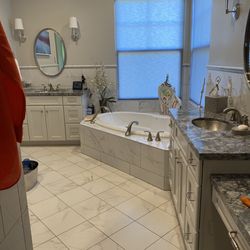 Maid In The Southwest - Wiped down light fixtures, countertops, shined copper sinks bath tub and floors