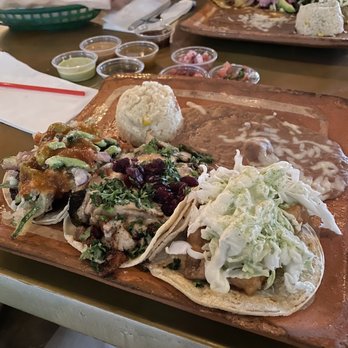 La Santisima - From left: Tamarindo Mahi Mahi, Chile en Nogada with Chicken, Baby Shark. - Mexican Near Me - Phoenix, Arizona La Santisima - From left: Tamarindo Mahi Mahi, Chile en Nogada with Chicken, Baby Shark. - Mexican Near Me - Phoenix, Arizona