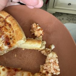Little Caesars Pizza - Hair baked into the pizza