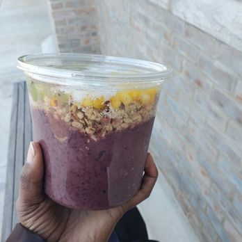 Pure Raw Juice - Base: Acai / Banana / apple juice Toppings: mango / kiwi / coconut shreds - Juice Bars & Smoothies Near Me - Baltimore, Maryland