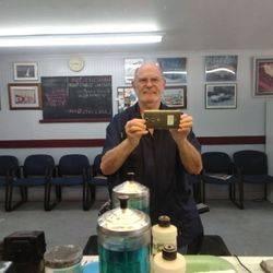 College Barber Shop - Bruce Daniel --- manager of the barber shop