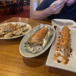 Spicy Tuna Roll, flaming lion king and fish boy roll