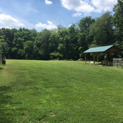 Wolf Run Bark Park - Well-maintained grassy area with plenty of shade.