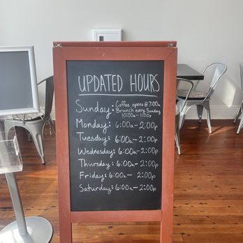 Beans And Beignets - a chalk board with a menu on it - Breakfast & Brunch Near Me - Earlham, Iowa