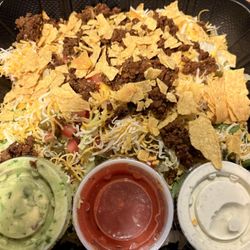 Fiddlesticks Bar and Grill - Taco Salad: the dressing, salsa and guac were good. There was barely any meat in it though.