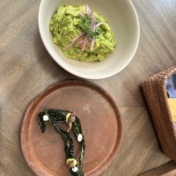 Los Danzantes - Quac and a complementary grasshopper on top of kale. - Mexican Near Me - Oaxaca, OAX Los Danzantes - Quac and a complementary grasshopper on top of kale. - Mexican Near Me - Oaxaca, OAX