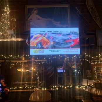The Retreat - a large screen in a restaurant - Sports Bars Near Me - Liverpool, New York