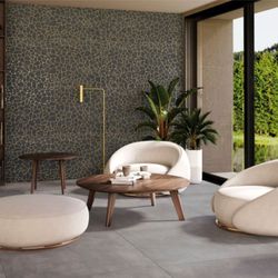 Maxi Flooring & Bath - Warm textures and statement walls that bring depth and sophistication.