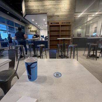 Mendocino Farms - Wooden booths have back cushions, nice touch - Salad Near Me - Austin, Texas
