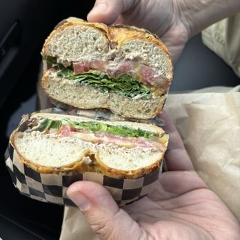 Atomic Bagel - Hatch chili cheddar with black garlic cream cheese plus arugula and tomato - Bagels Near Me - Port Angeles, Washington Atomic Bagel - Hatch chili cheddar with black garlic cream cheese plus arugula and tomato - Bagels Near Me - Port Angeles, Washington