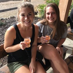 The Merry Hearted Cidery - Megan and Gabby enjoying some wonderful cider outside