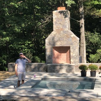 Red Cedar Landscaping - Fireplace anchors this patio and hot tub project. - Tree Services Near Me - Wappingers Falls, New York Red Cedar Landscaping - Fireplace anchors this patio and hot tub project. - Tree Services Near Me - Wappingers Falls, New York