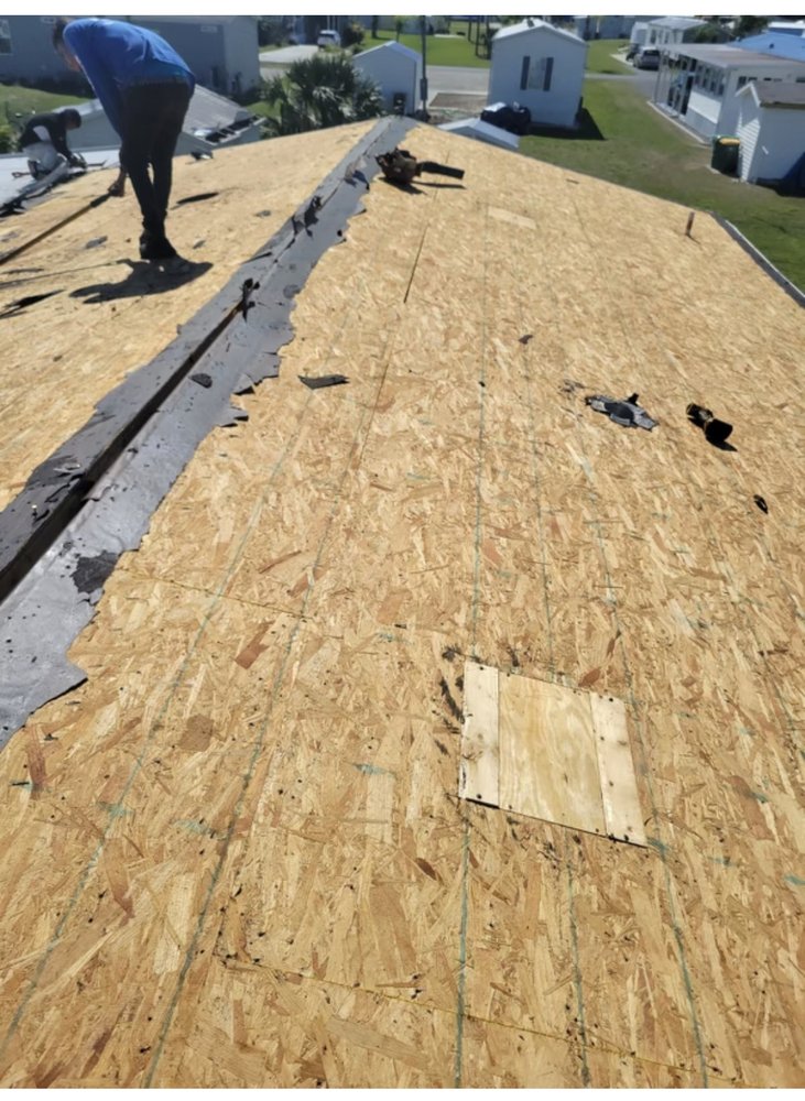 Slide of ARK Roofing