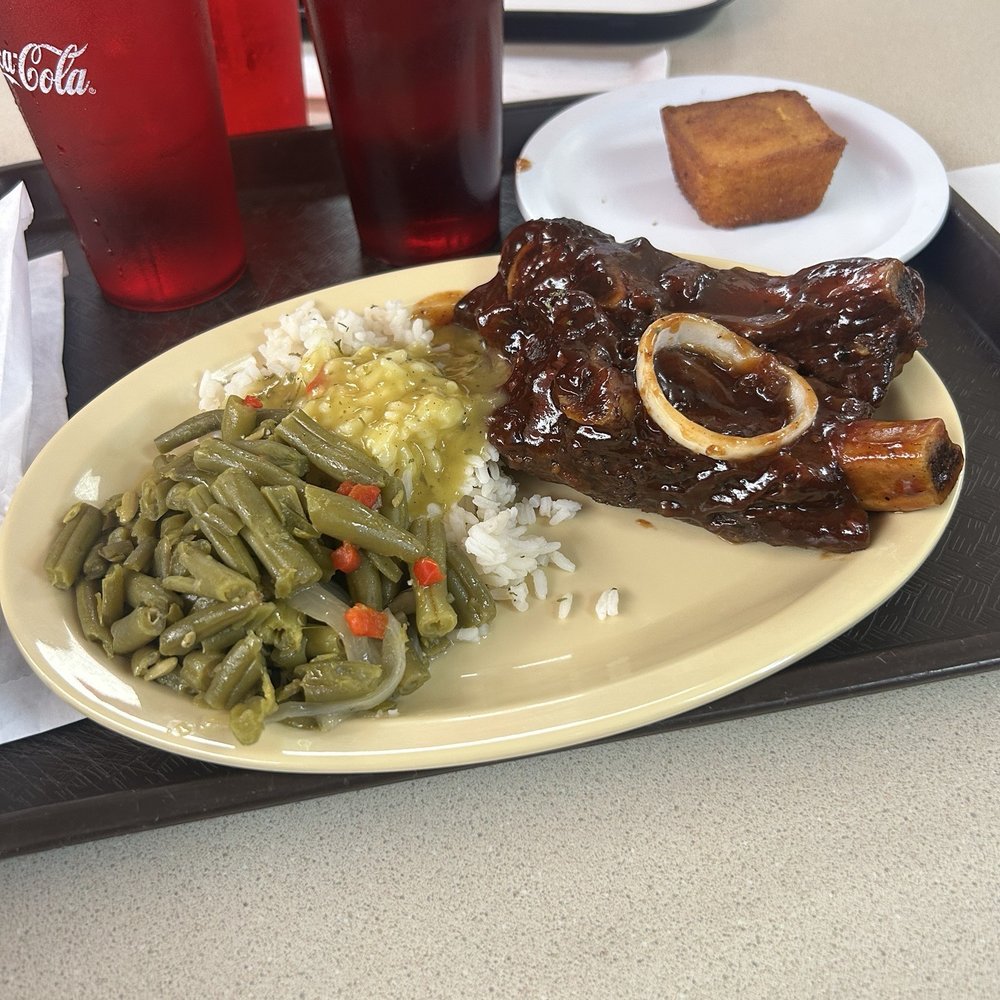 BBQ Beef Ribs Dinner, rice and gravy, green beans and a corn muffin. BBQ Beef Ribs Dinner, rice and gravy, green beans and a corn muffin.