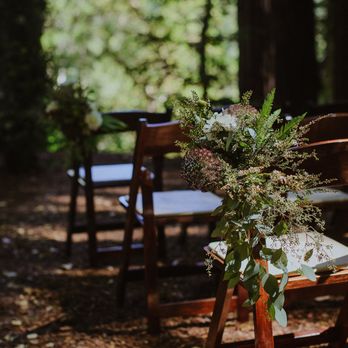 Boheme Events - The flower arrangements that lined the aisle for our wedding ceremony. - Party & Event Planning Near Me