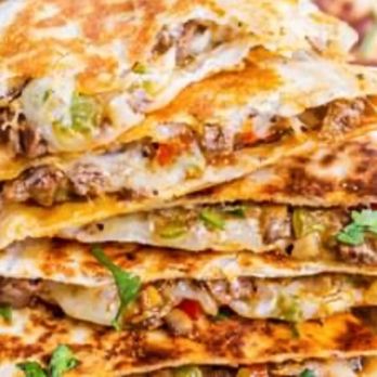 Coco Mango Island Grille - a stack of quesadillas - Food Trucks Near Me - Lewes, Delaware Coco Mango Island Grille - a stack of quesadillas - Food Trucks Near Me - Lewes, Delaware