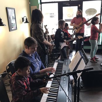 Pure Rock Studios - Group class performing downtown! - Musical Instruments & Teachers Near Me - Rochester, Minnesota Pure Rock Studios - Group class performing downtown! - Musical Instruments & Teachers Near Me - Rochester, Minnesota