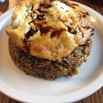 Rasa Ria - Indonesian chicken fried rice topped with a fried egg. - Indonesian Near Me - Kalamazoo, Michigan Rasa Ria - Indonesian chicken fried rice topped with a fried egg. - Indonesian Near Me - Kalamazoo, Michigan