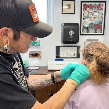 Metal & Stone - Eddie marking the ears. - Piercing Near Me - San Diego, California Metal & Stone - Eddie marking the ears. - Piercing Near Me - San Diego, California