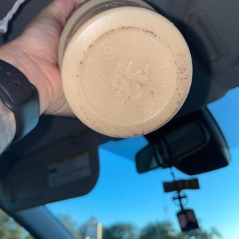 Dunkin' - That's some sort of dirt/ uncleanliness from the inside of the cup. Trust me it's not from ground up coffee beans either. - Coffee & Tea Near Me - Brooksville, Florida