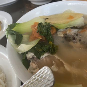 Estrellita - Half eaten sinigang. Actually the presentation is always super nice. Sorry for the demolished soup. It hits the spot! - Filipino Near Me - Atlanta, Georgia