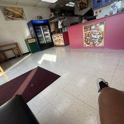 Mr Pizza & Subs - Inside was very clean. The kitchen was clean as well.