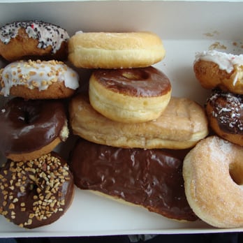 The Donut House - 12 Donuts, minus 1 coz Hubs devoured one of them before I can take the pictures fast enough.  Donut House April 20th 2013. - Donuts Near Me - Aurora, Colorado