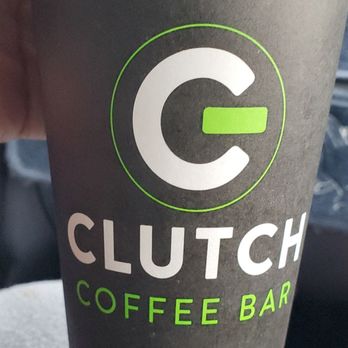 Clutch Coffee Bar - a hand holding a cup of coffee - Coffee & Tea Near Me - Lexington, South Carolina Clutch Coffee Bar - a hand holding a cup of coffee - Coffee & Tea Near Me - Lexington, South Carolina
