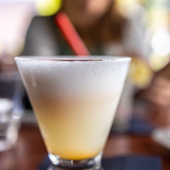 Pisco Bar - Pisco Sour Serrano ($14) Pisco puro, fresh lime juice, simple syrup, egg whites, angostura & bitters - Peruvian Near Me - Saratoga, California Pisco Bar - Pisco Sour Serrano ($14) Pisco puro, fresh lime juice, simple syrup, egg whites, angostura & bitters - Peruvian Near Me - Saratoga, California