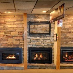 Best Fire Hearth & Patio - Electric fireplace insert display at the Best Fire showroom.