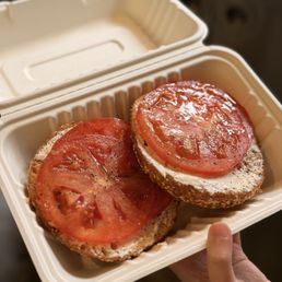 Bagel with cream cheese and tomato Bagel with cream cheese and tomato