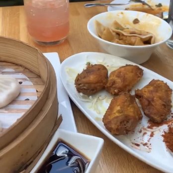 Dan Dan - Ardmore - Pork Dumplings in Chili Oil (8pc) & Turmeric Fried Chicken Wings 8pcs - Cocktail Bars Near Me - Ardmore, Pennsylvania Dan Dan - Ardmore - Pork Dumplings in Chili Oil (8pc) & Turmeric Fried Chicken Wings 8pcs - Cocktail Bars Near Me - Ardmore, Pennsylvania