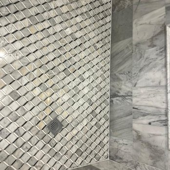 The Grout Medic of North Chicago, IL - Marble shower floor regrout cleaning and sealing and caulking - Tiling Near Me - Chicago, Illinois