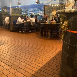 Mariscos Chihuahua - Dining room and whole fried Sea Bass.