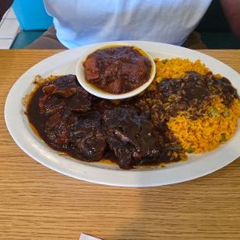 Montego Island Grill - Large oxtail platter with yellow rice and yams - Seafood Near Me - Virginia Beach, Virginia Montego Island Grill - Large oxtail platter with yellow rice and yams - Seafood Near Me - Virginia Beach, Virginia