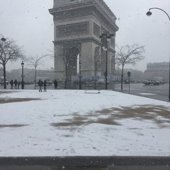 Louis Vuitton - Just got off the Metro on my way to Champs Elysee. Arc de Triomphe in snow. - Luggage Near Me - Paris, 75 Louis Vuitton - Just got off the Metro on my way to Champs Elysee. Arc de Triomphe in snow. - Luggage Near Me - Paris, 75