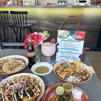 Los Chilakillers - Chilaquiles with chorizo & egg with potato's and beans. Carne Asada Fries Carne Asada Taco - Mexican Near Me - Santa Ana, California Los Chilakillers - Chilaquiles with chorizo & egg with potato's and beans. Carne Asada Fries Carne Asada Taco - Mexican Near Me - Santa Ana, California