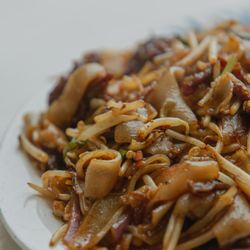 Happy Bao's - Classic Beef Chow Fun made with fresh homemade noodles. The result is a much softer and springy noodle that holds up better to wok frying.