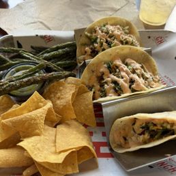 Baja fish tacos, green beans and homemade chips Baja fish tacos, green beans and homemade chips