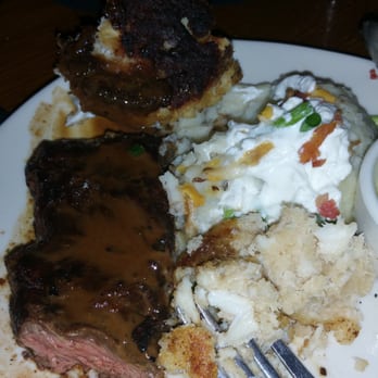 Outback Steakhouse - Flat iron steak, loaded potato and burnt crab cake......come on outback do better please!!!! - Steakhouses Near Me - Secaucus, New Jersey