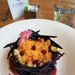 Dark chocolate dessert with passion fruit mousse and berry bursting pearls, decadent! Dark chocolate dessert with passion fruit mousse and berry bursting pearls, decadent!