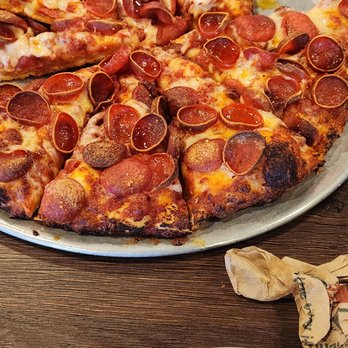 Mountain Mike's Pizza - This is the 28.00 burnt pizza with gen x service.  This is crispy / burnt - Pizza Near Me - Placerville, California