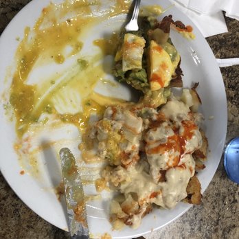 Carolyn's Cafe - California Benedict w hollandaise sauce instead of green salsa bc its too spicy for me w potatoes & gravy w cholula sauce - Breakfast & Brunch Near Me - Redlands, California