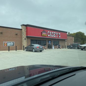 Casey's - cars parked in front of the store - Pizza Near Me - Wellsville, Kansas Casey's - cars parked in front of the store - Pizza Near Me - Wellsville, Kansas