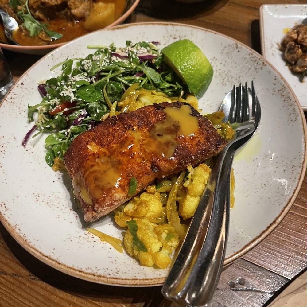 Teni East Kitchen - CRISPY SKIN SALMON (GF) - Burmese Near Me - Oakland, California Teni East Kitchen - CRISPY SKIN SALMON (GF) - Burmese Near Me - Oakland, California